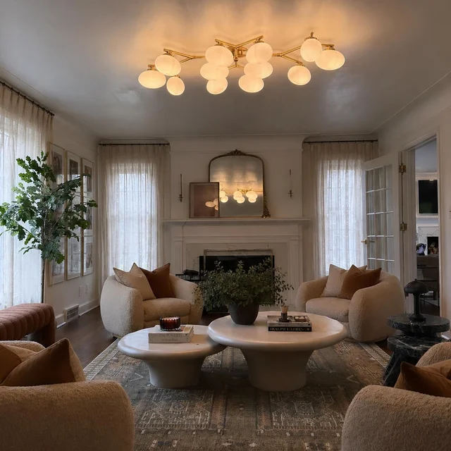 Soft sheer panels filtering daylight across three windows
